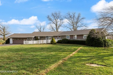 SET IN A PEACEFUL RURAL SETTING yet conveniently close to major