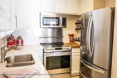 Beautifully upgraded & fully furnished, this 3-bedroom, 3-bath - photo 28