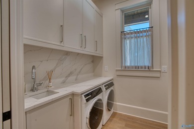 Custom-built home w/ breathtaking lake & mountain views. Open - photo 30