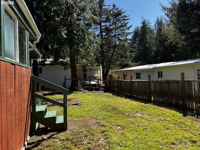 This charming 2-bedroom, 1-bath manufactured home sits on a - photo 37