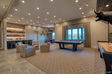 Custom-built home w/ breathtaking lake & mountain views. Open - photo 39