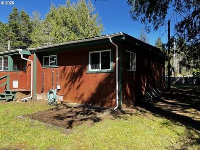 This charming 2-bedroom, 1-bath manufactured home sits on a - photo 40