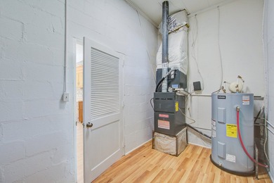 Welcome to this charming 3-bedroom brick ranch nestled on a - photo 41