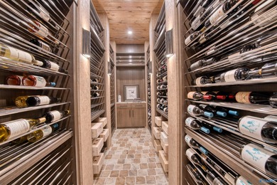 Custom-built home w/ breathtaking lake & mountain views. Open - photo 42