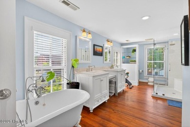 Step into the charm and character of downtown living in this - photo 16