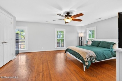 Step into the charm and character of downtown living in this - photo 17
