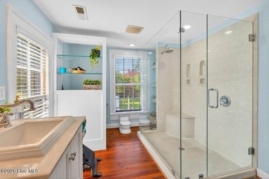 Step into the charm and character of downtown living in this - photo 18