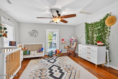 Step into the charm and character of downtown living in this - photo 19