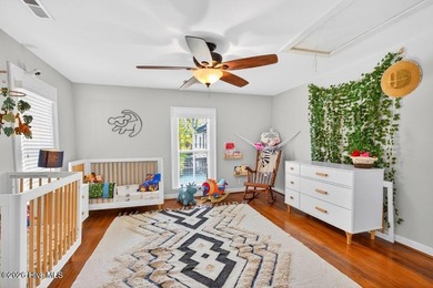 Step into the charm and character of downtown living in this - photo 20