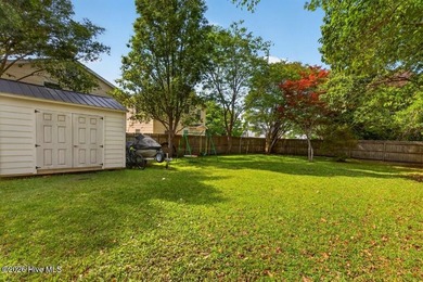 Step into the charm and character of downtown living in this - photo 23