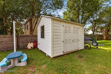 Step into the charm and character of downtown living in this - photo 24