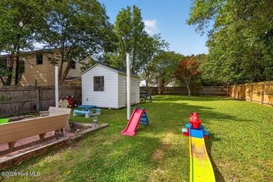 Step into the charm and character of downtown living in this - photo 25