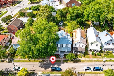 Step into the charm and character of downtown living in this - photo 30