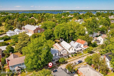 Step into the charm and character of downtown living in this - photo 31