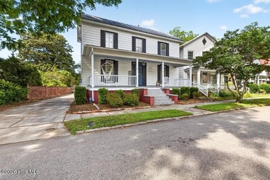 Step into the charm and character of downtown living in this - photo 32