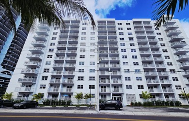 Welcome to this charming 2-bedroom, 1-bathroom condominium - photo 1