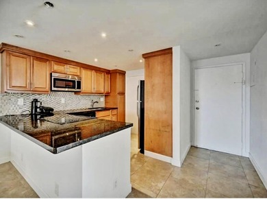 Welcome to this charming 2-bedroom, 1-bathroom condominium - photo 9