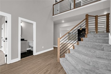 Welcome home to this stunning brand-new construction nestled in - photo 4