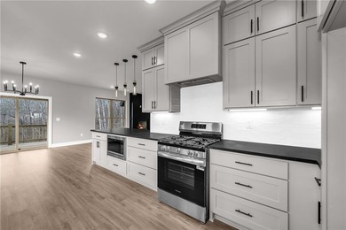 Welcome home to this stunning brand-new construction nestled in - photo 10