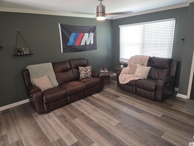 Step into the fully renovated 3 bedroom 2 bath home with a - photo 3