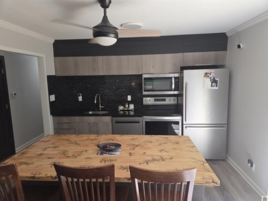 Step into the fully renovated 3 bedroom 2 bath home with a - photo 5