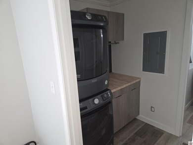 Step into the fully renovated 3 bedroom 2 bath home with a - photo 9