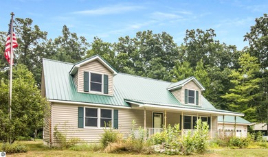 (private lake, pond, creek) Home For Sale in Irons Michigan