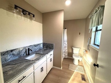 Recently updated 3-bedroom, 2-bath home situated on 5 beautiful - photo 32