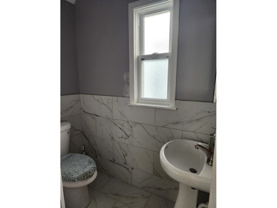 Welcome to this beautifully renovated Victorian home overlooking - photo 8