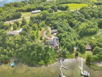 Experience luxury lake living at this incredible 4 bedroom, 4 - photo 2