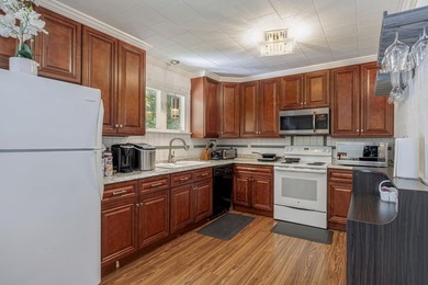 Adorable split level ranch in immaculate shape with large fenced - photo 25