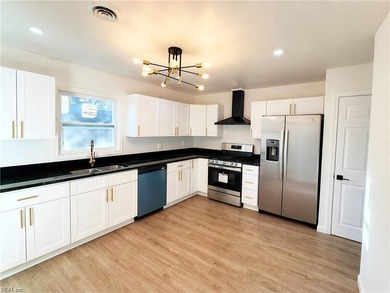 Welcome Home! Step into this beautifully renovated 3BR 2BA home - photo 3