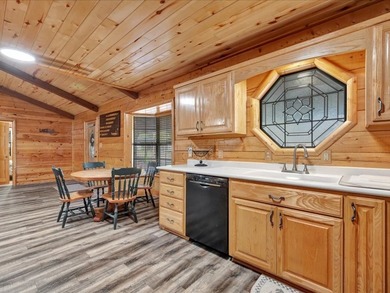 This lake property is special, featuring multiple living - photo 14