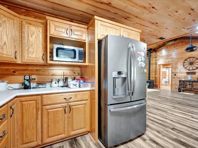 This lake property is special, featuring multiple living - photo 15