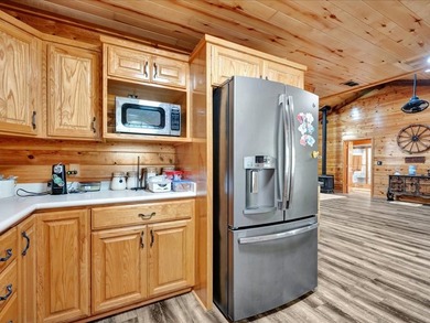 This lake property is special, featuring multiple living - photo 16