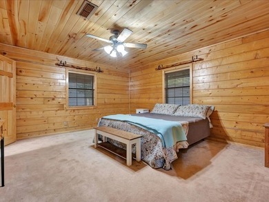 This lake property is special, featuring multiple living - photo 17