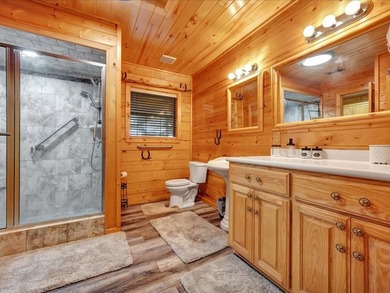 This lake property is special, featuring multiple living - photo 18