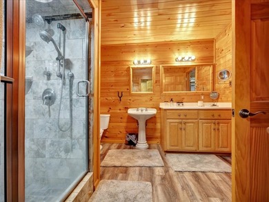 This lake property is special, featuring multiple living - photo 19
