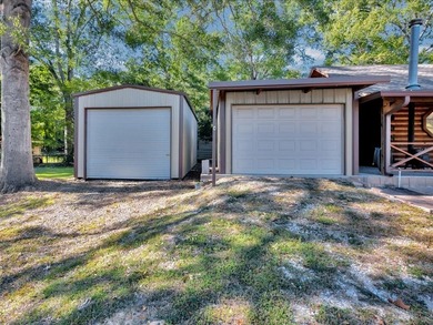 This lake property is special, featuring multiple living - photo 23