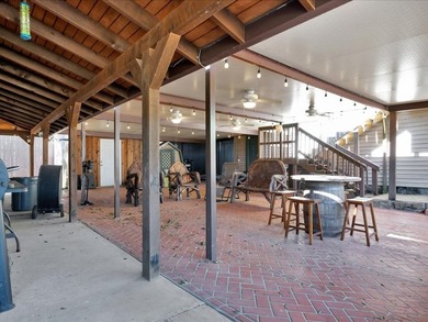 This lake property is special, featuring multiple living - photo 24
