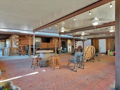 This lake property is special, featuring multiple living - photo 25