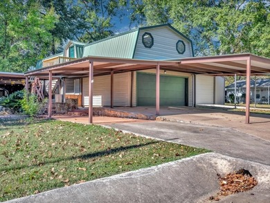 This lake property is special, featuring multiple living - photo 29
