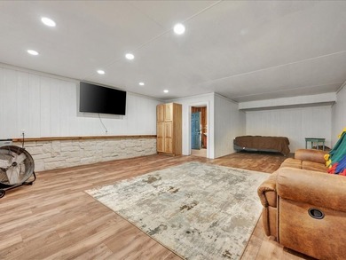 This lake property is special, featuring multiple living - photo 30