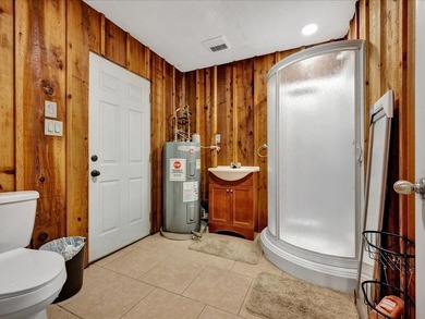This lake property is special, featuring multiple living - photo 32