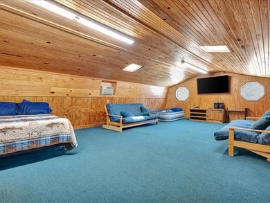This lake property is special, featuring multiple living - photo 33
