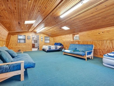 This lake property is special, featuring multiple living - photo 34