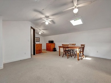 This lake property is special, featuring multiple living - photo 35