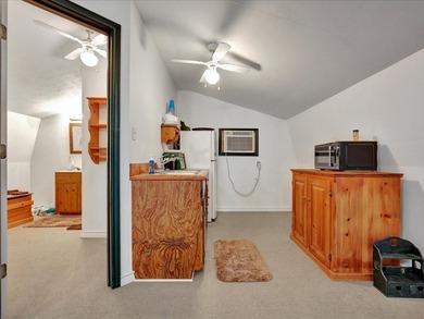 This lake property is special, featuring multiple living - photo 36