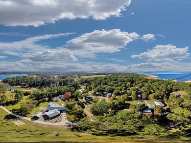 This lake property is special, featuring multiple living - photo 49
