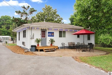 Located in the heart of Grand Rivers, this 3-bedroom, 1 - photo 2